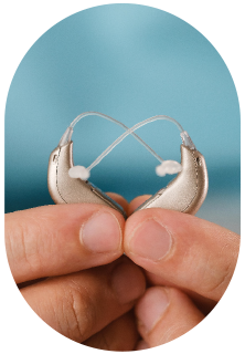 Discreet, modern hearing aids in silver
